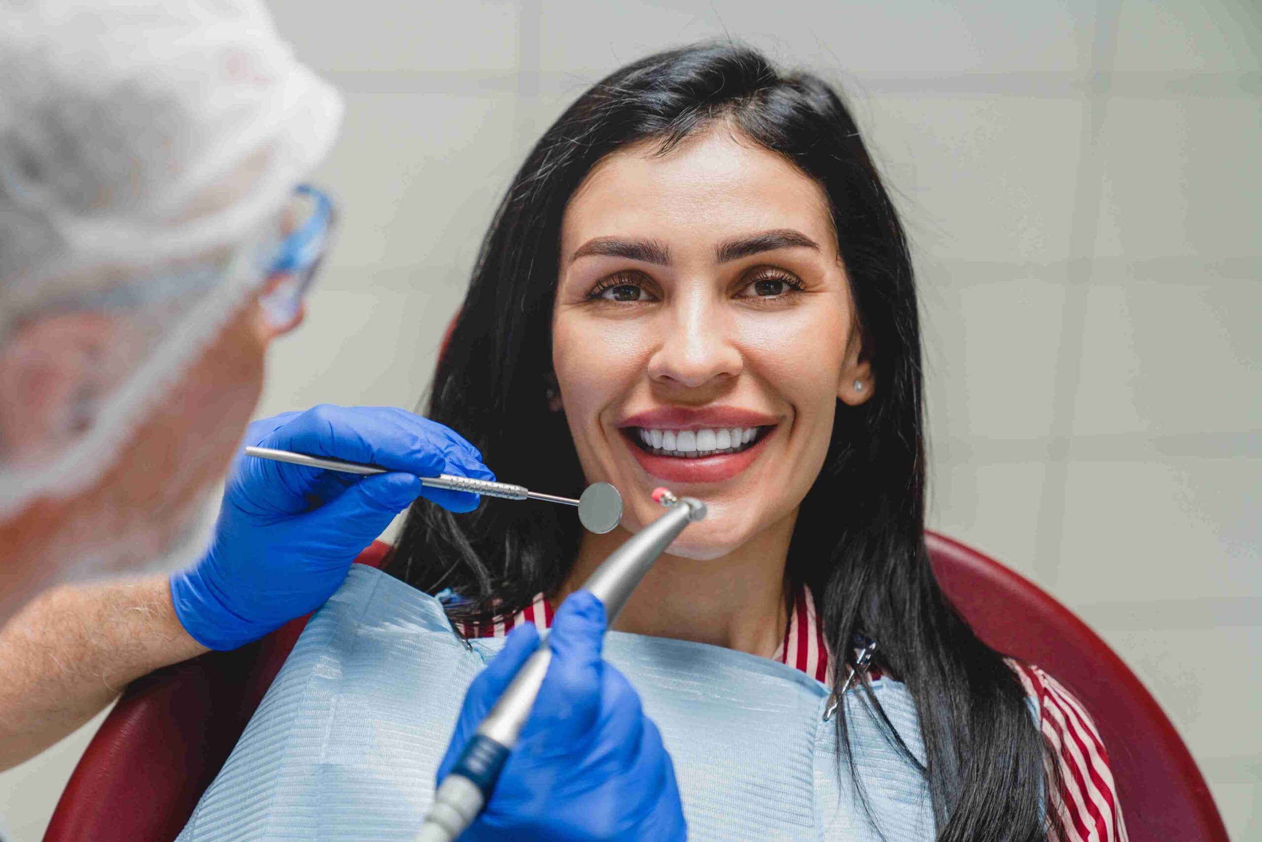 Patient receiving a routine dental examination.